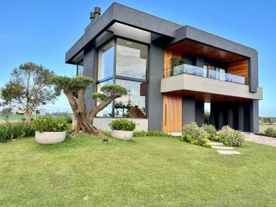 Casa em Condomínio 4 dormitórios para venda, Arroio Teixeira em Capão da Canoa | Ref.: 4593
